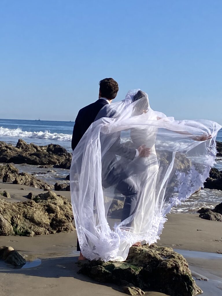 bride and groom portraits by the ocean