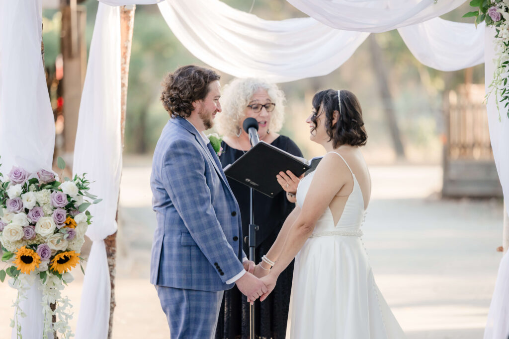 Mitzi Schwarz officiating a wedding